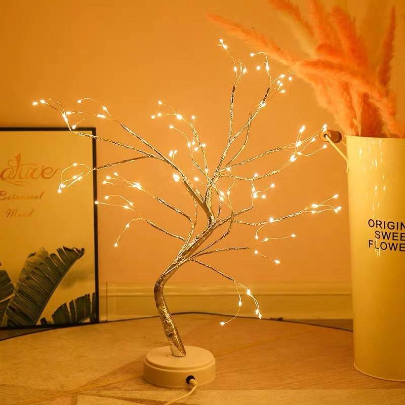 LED copper wire light designed as an artistic tree-shaped bedroom lamp with warm white fairy lights on a round base