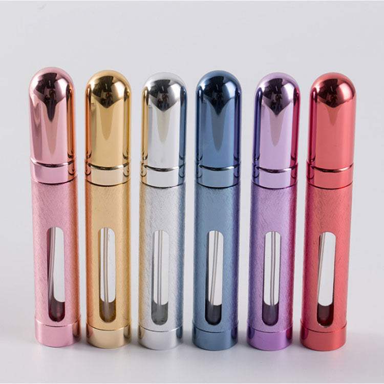 12ml portable perfume bottles in six colors with aluminum exterior and glass liner.
