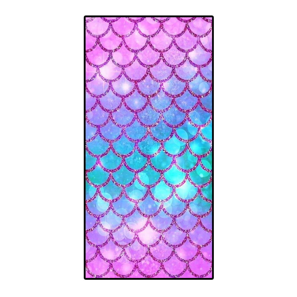 Colorful microfiber bath towel with mermaid scale design.