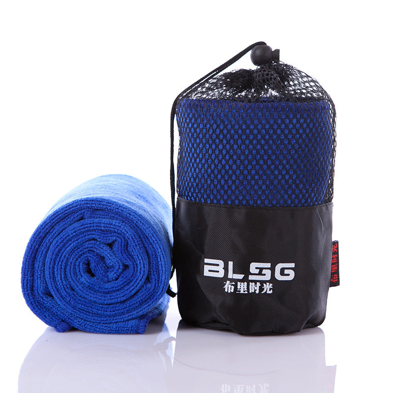 Light green fitness sports towel and mesh carry bag.