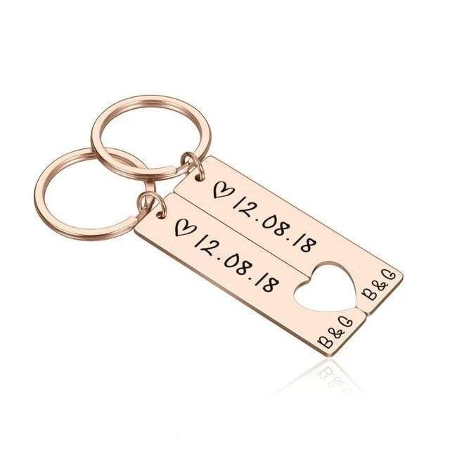Customized couples keychain with engraved date and initials, perfect for anniversary or Valentine's gift.