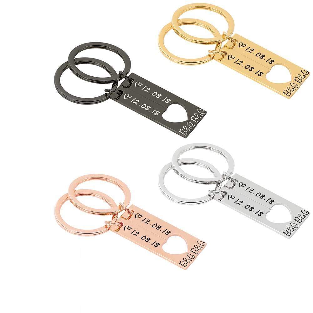 Customized couples keychain in silver, gold, rose gold, and black with engraved date.