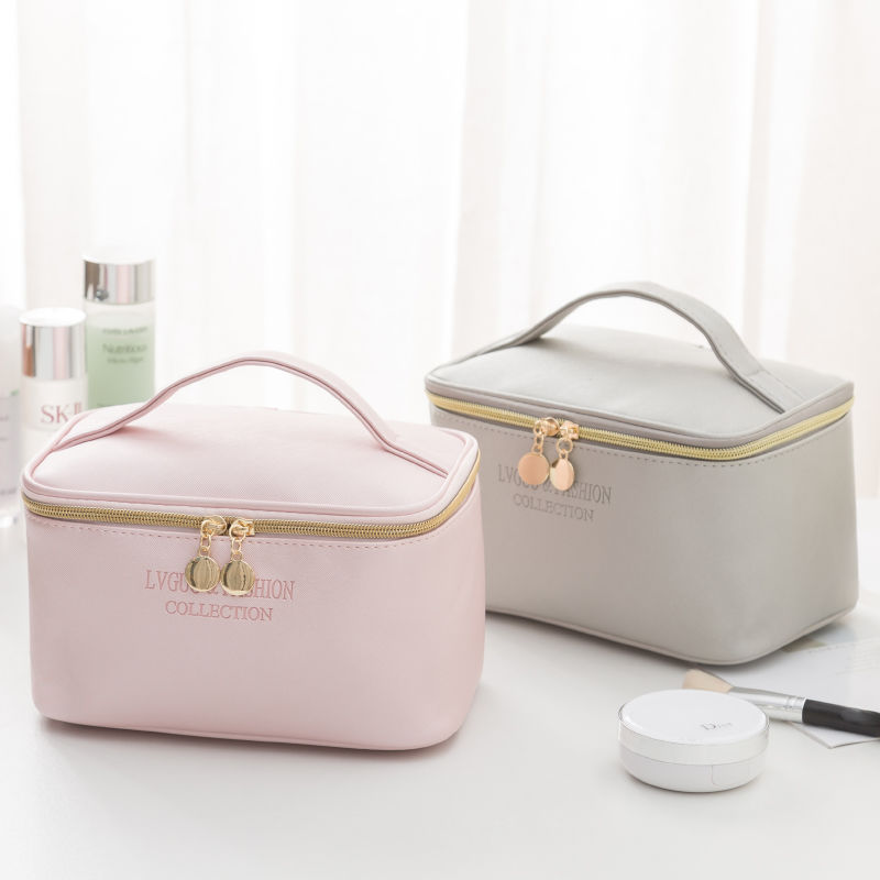 Waterproof storage bags in pink and gray, medium-sized, PU leather, with zipper closure.