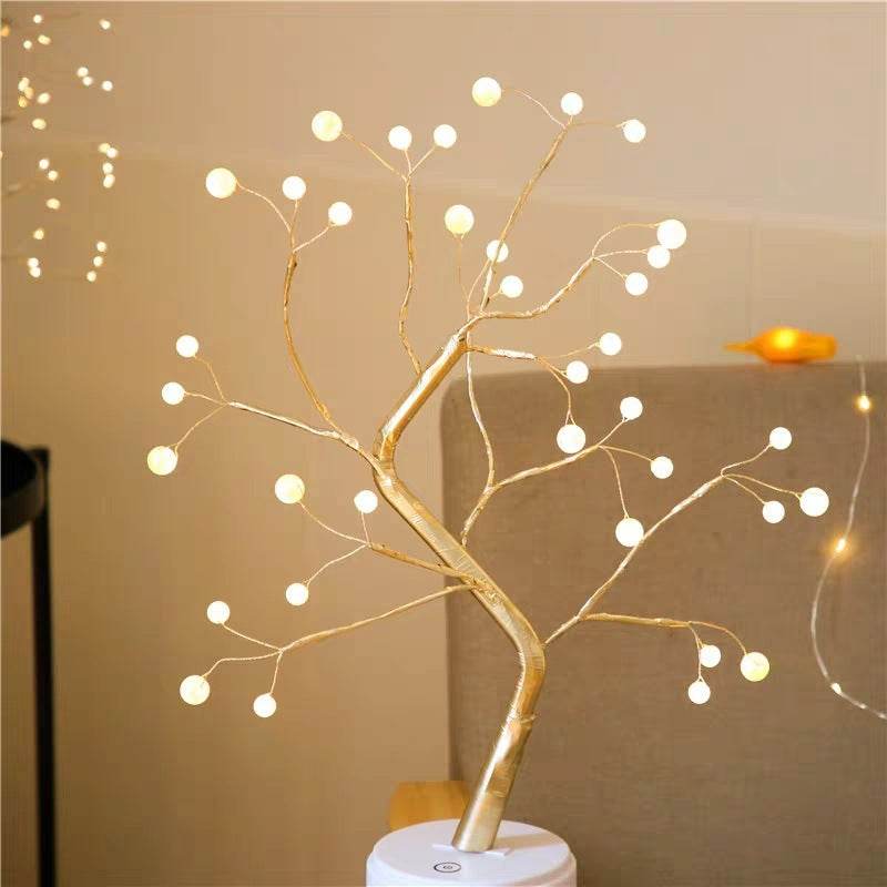 LED copper wire light shaped like a golden tree with warm white glowing bulbs for bedroom decor
