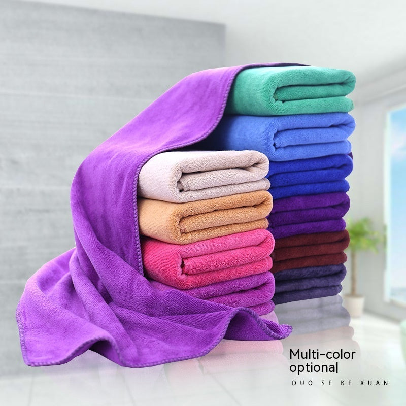 Microfiber Thickened Car Wash Cleaning Towels in multiple colors, including dark purple, brown, and dark blue folded neatly.