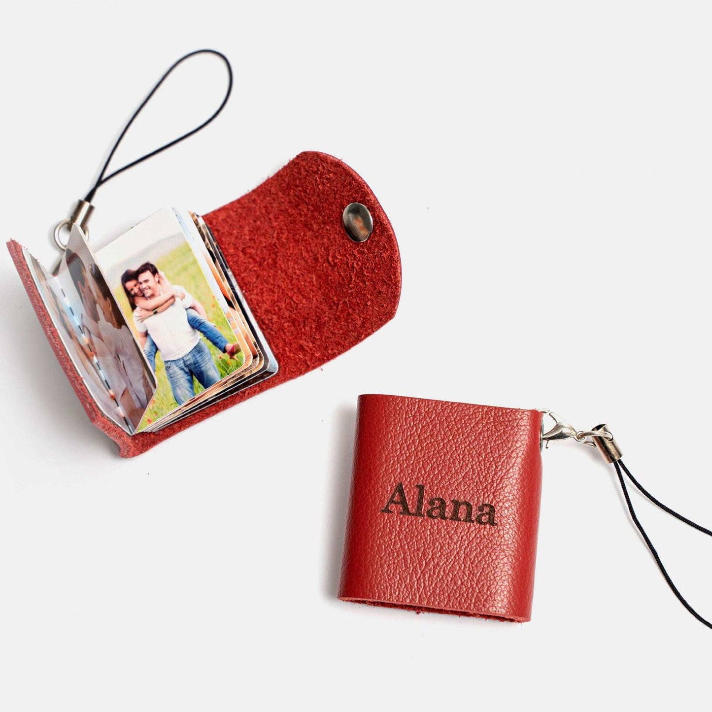 Mini leather photo keychain in red, personalized with a name, featuring an envelope design capable of holding 10 photos.