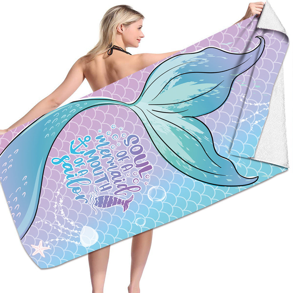 Microfiber bath towel with mermaid design and pastel colors.