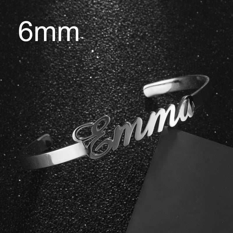 Customized name bracelet in silver stainless steel with "Emma" engraving.