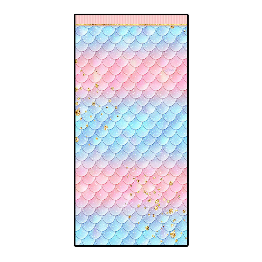 Colorful microfiber bath towel with a mermaid scale design.