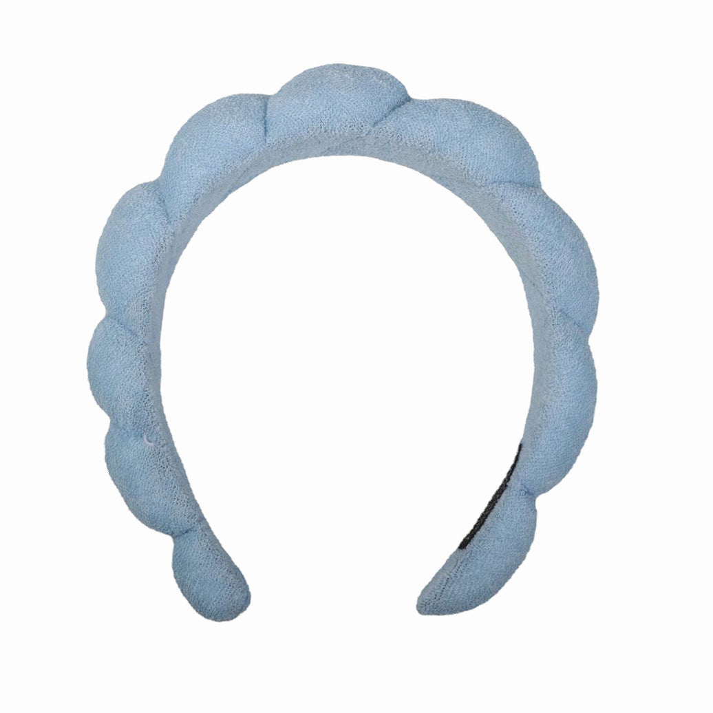 Denim blue handmade SPA headband for hair care.