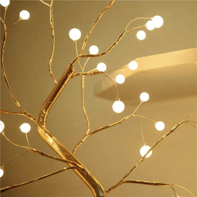 LED copper wire light with warm white globe bulbs on gold branches for bedroom decor