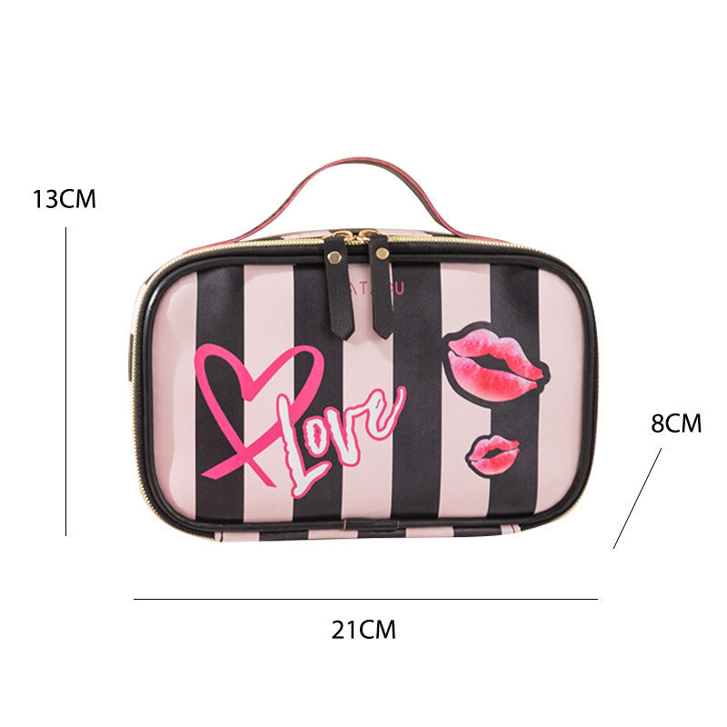 Portable toiletry bag in pink and black stripes with love and lips print design, PU leather material, small size with zipper closure.