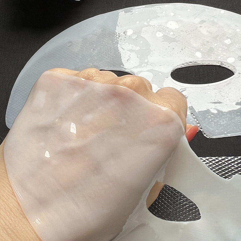 Collagen Crystal Jelly Skin Moisturizing Mask being applied to a hand.