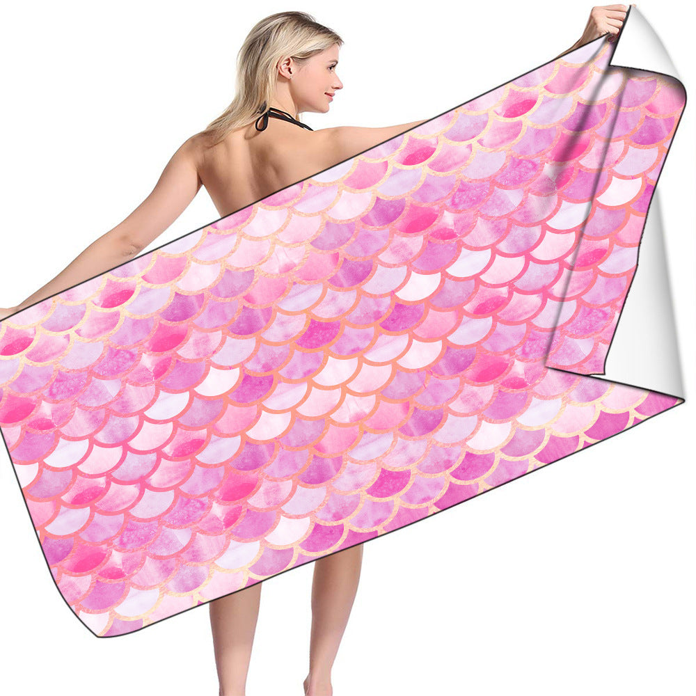Microfiber bath towel with pink mermaid scale pattern.