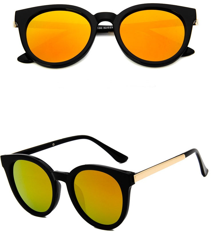 Pink vintage cat-eye sunglasses for women with mirrored lenses and square frames.