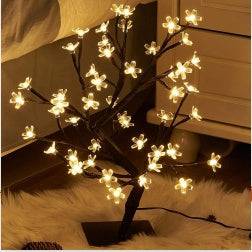 LED copper wire light shaped like a flowering tree with warm white lights for bedroom decoration