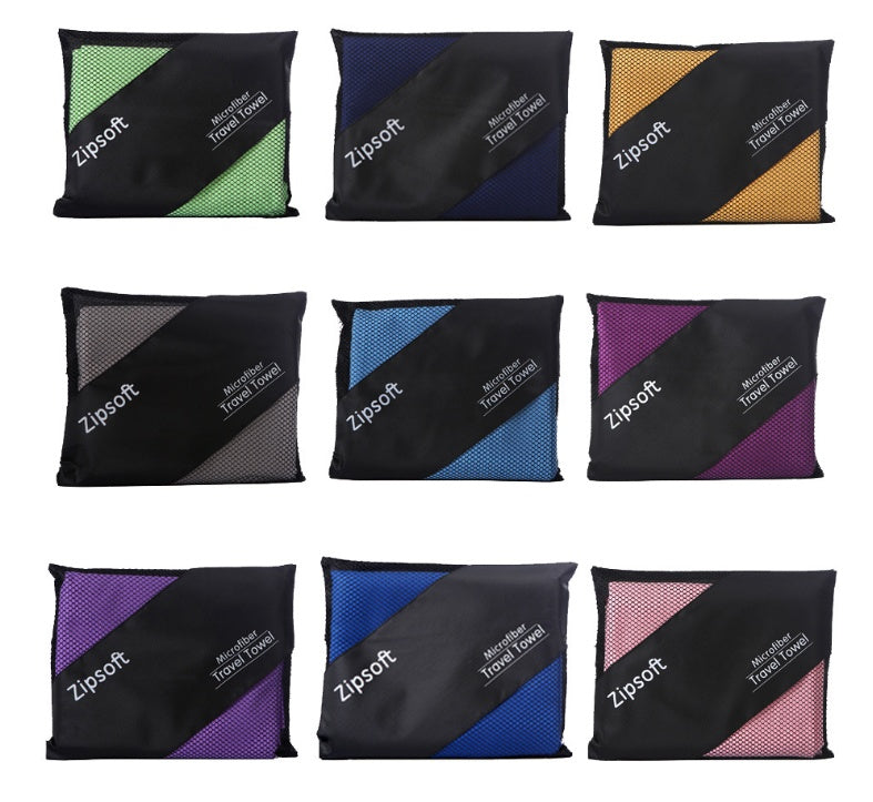 Superfine fiber exercise towels in various colors folded in compact pouches.