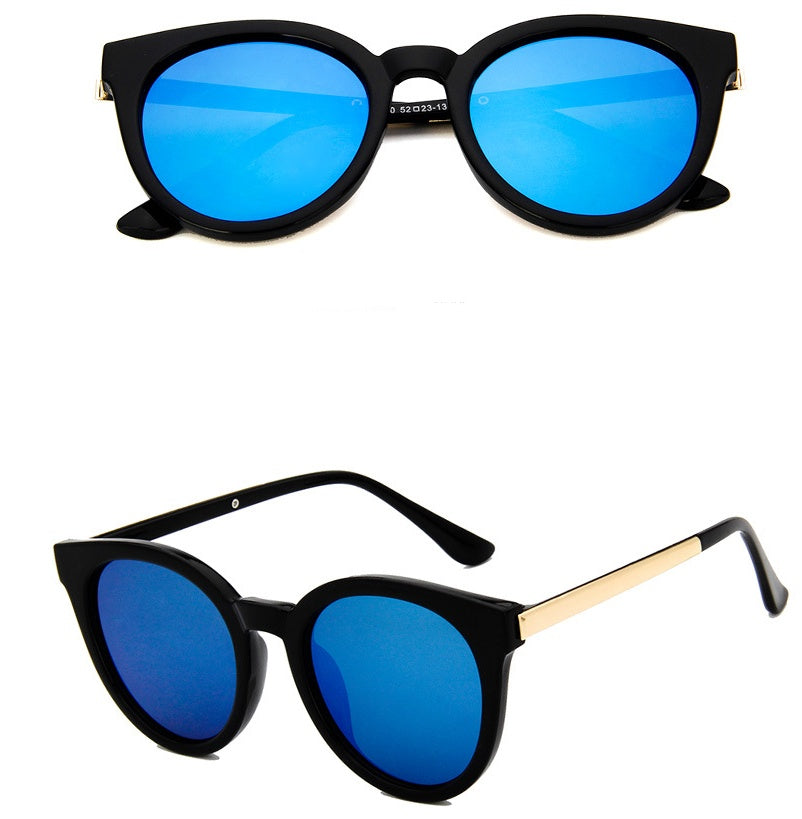 Pink cat eye sunglasses for women, vintage style with square frames and mirror lenses.