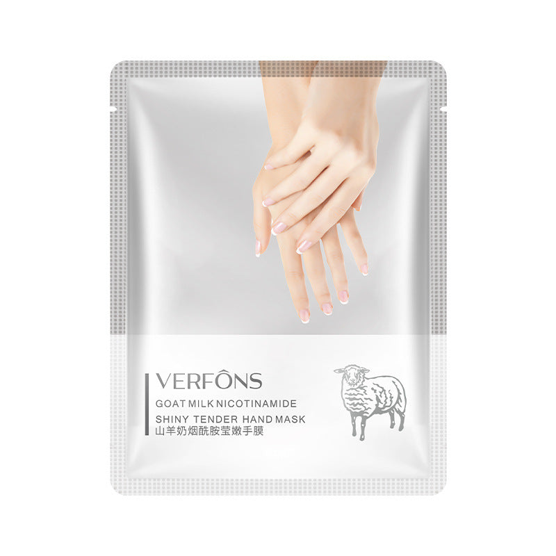 Moisturizing hand mask packaging with goat milk and niacinamide ingredients.
