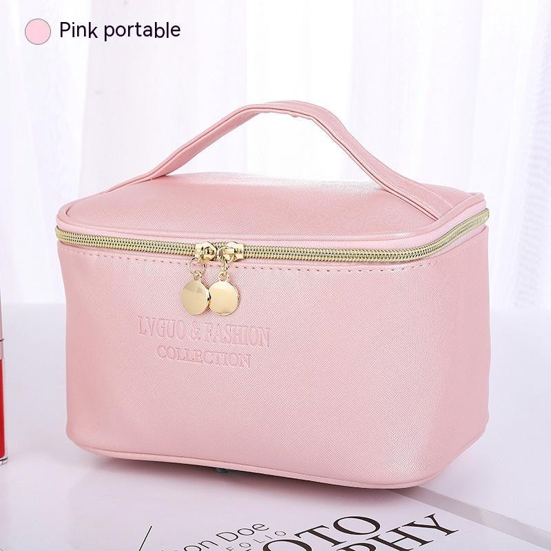 Pink waterproof storage bag with zipper, ideal for travel and makeup; medium-sized, PU leather.