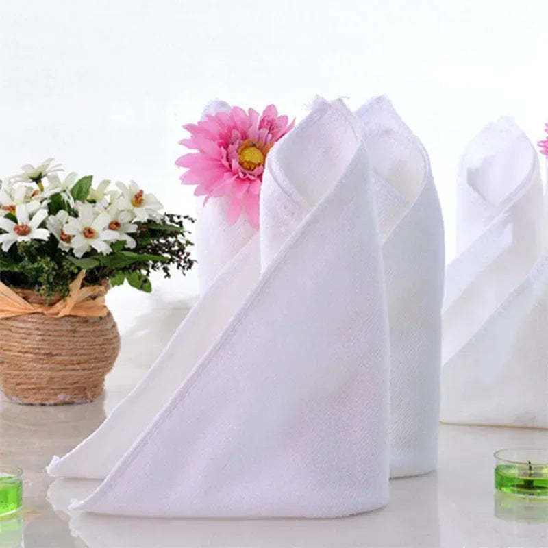 Absorbent thickened microfiber towel in white, suitable for hotel room cleaning.