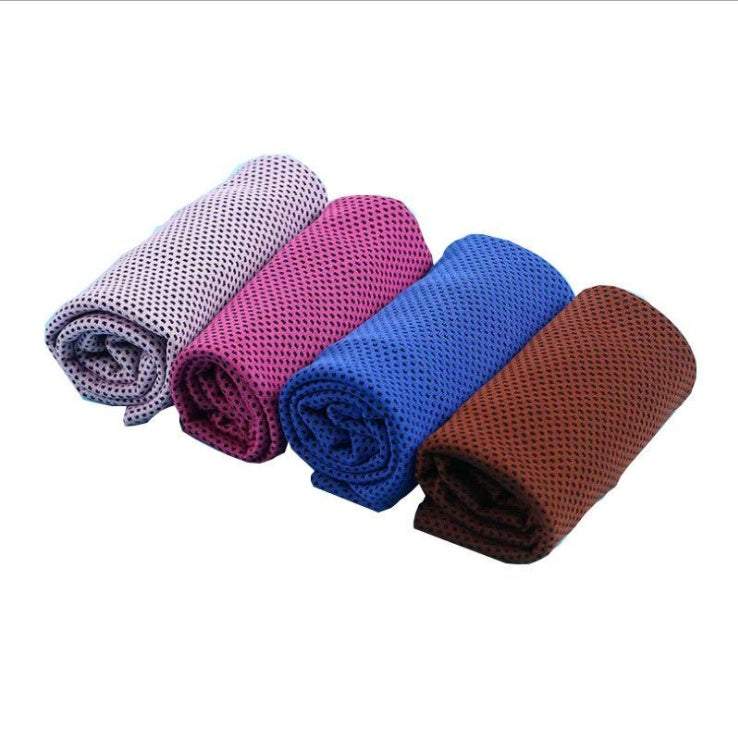 Colorful cooling towels made of polyester and cold silk, rolled neatly.
