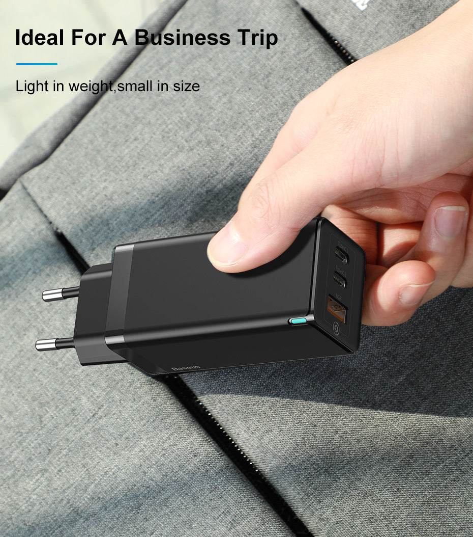 Fast mobile phone charger with multiple ports, ideal for travel.
