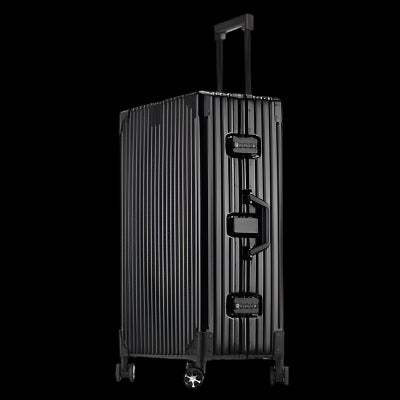 Large aluminum magnesium alloy luggage with 360° universal wheels in sleek silver finish.