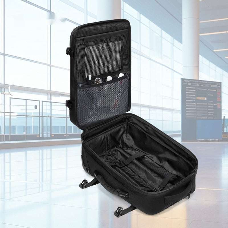 Multi-functional men's compression travel bag in black, open in an airport setting.