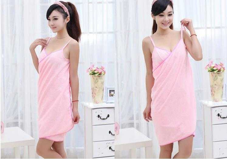 New style pink beach towel worn as a fashionable bath dress with straps.