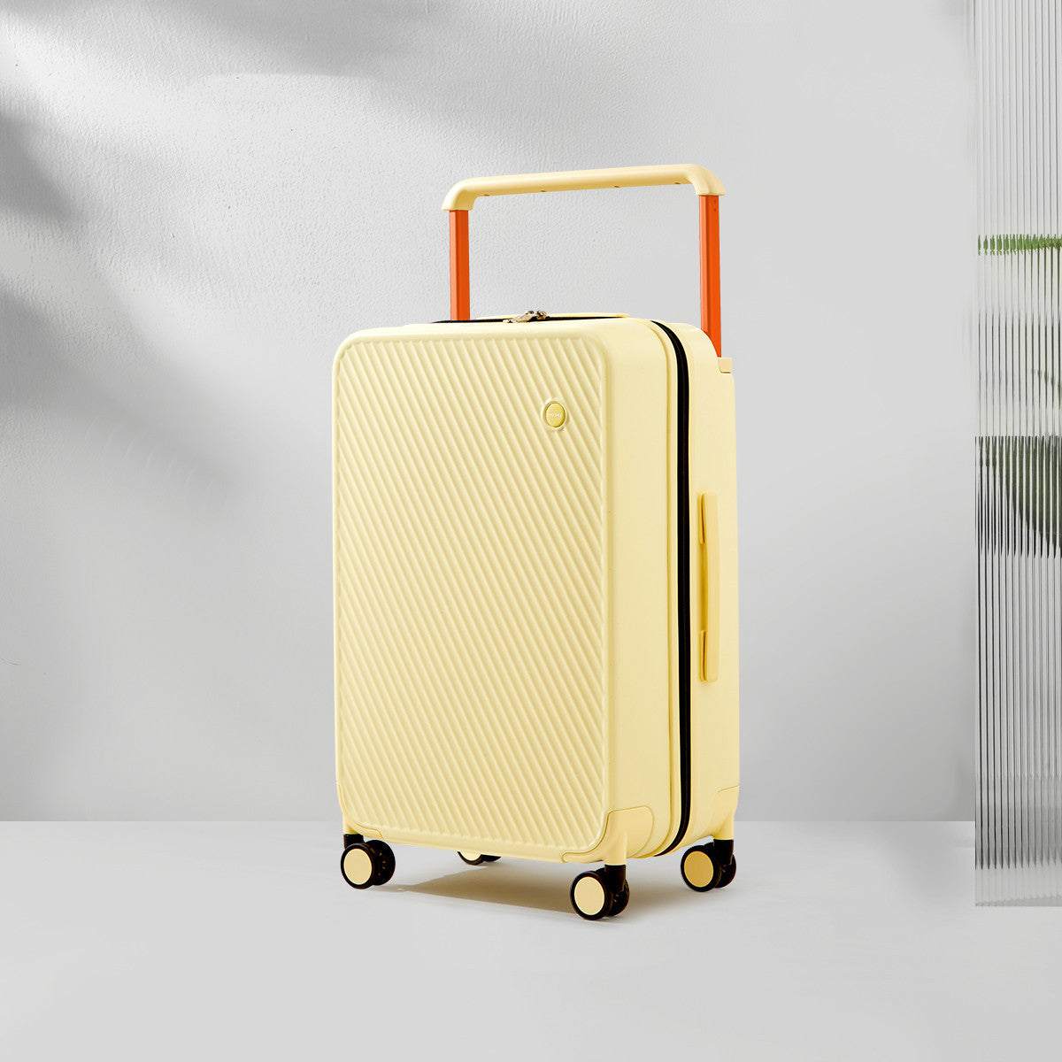 Wide trolley case with solid color, large capacity and PC texture, featuring a zipper closure and stylish design.