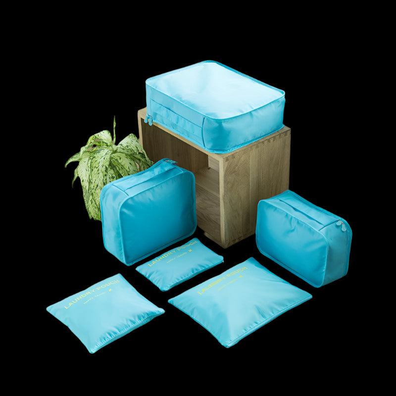 Assorted turquoise packing bags made of waterproof polyester in various sizes for organized storage.