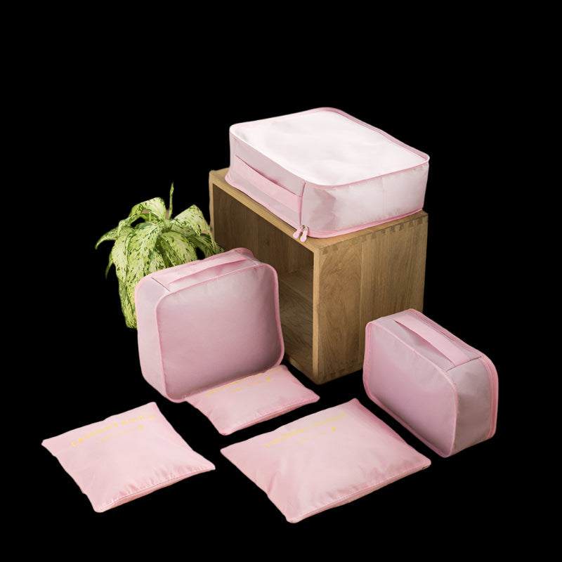 Pink packing bags made of waterproof polyester in various sizes.
