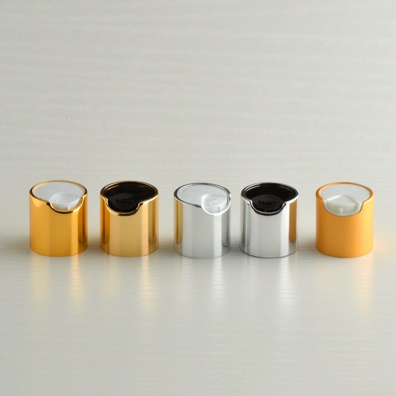 Anodized aluminum caps in gold and silver for bottling hydrosol bottles.
