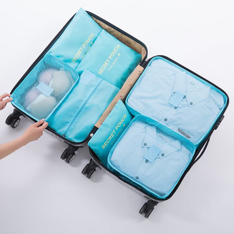 Travel luggage storage bag in suitcase with organized compartments