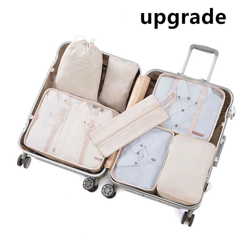 Travel luggage storage bag set in an open suitcase for organized packing.