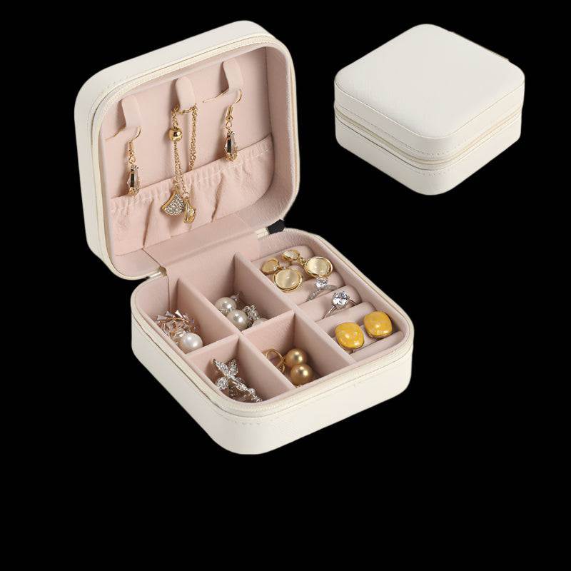 Travel portable accessories storage box in pearl white, showcasing compartments for jewelry and hair accessories.