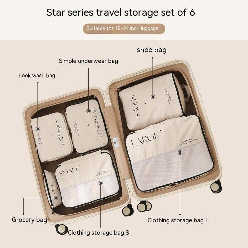 Travel storage bag set in suitcase, featuring various sizes for clothing and accessories.
