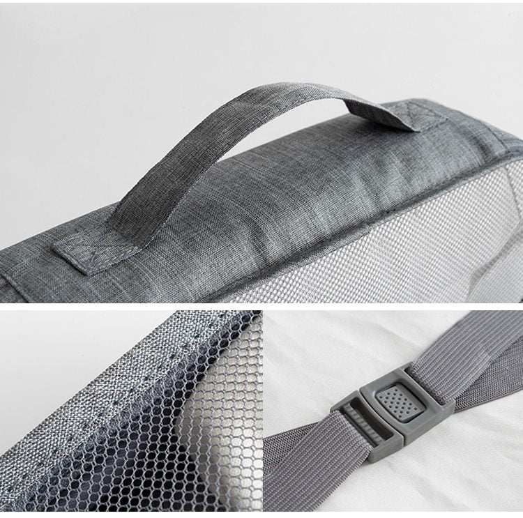 Waterproof travel tote bag details with gray handle and mesh material.