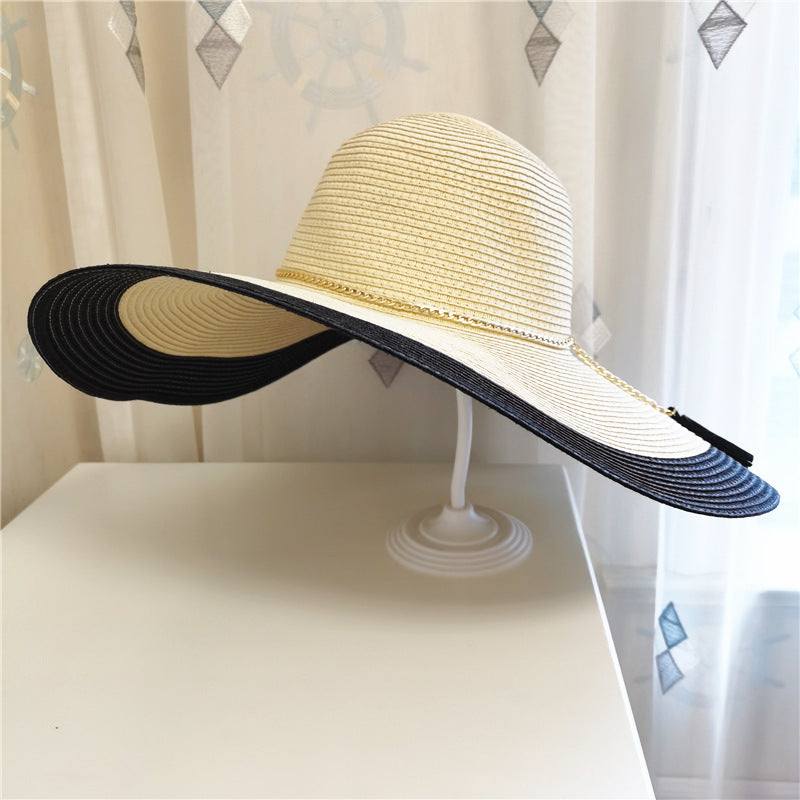 Summer sun protection big brim beach hat for women, straw material, warp knitting, in beige and black.