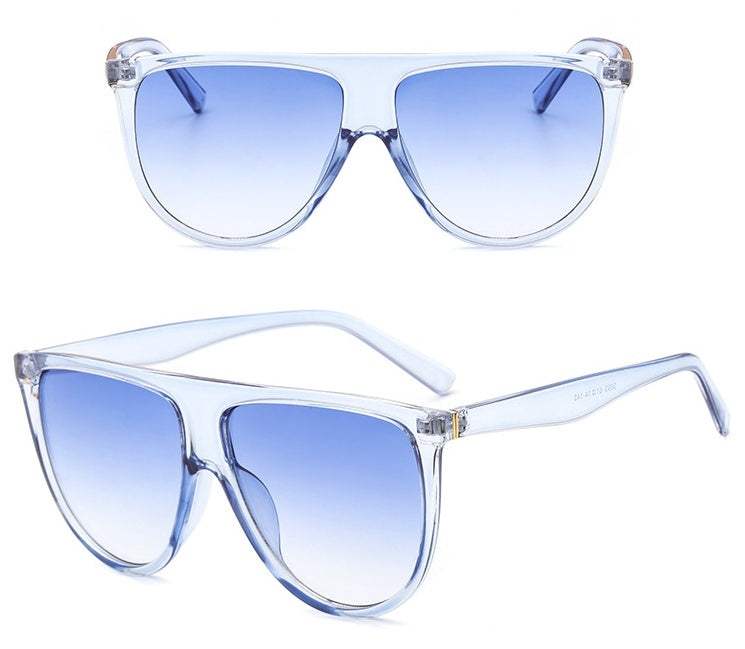 Sunglasses with gradient lenses and full frame design for women, offering UV protection.