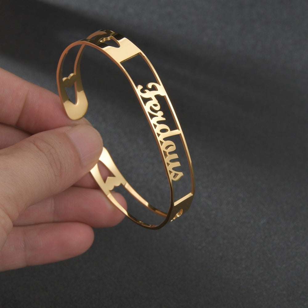 Gold stainless steel customized name bracelet on hand, personalized jewelry gift.