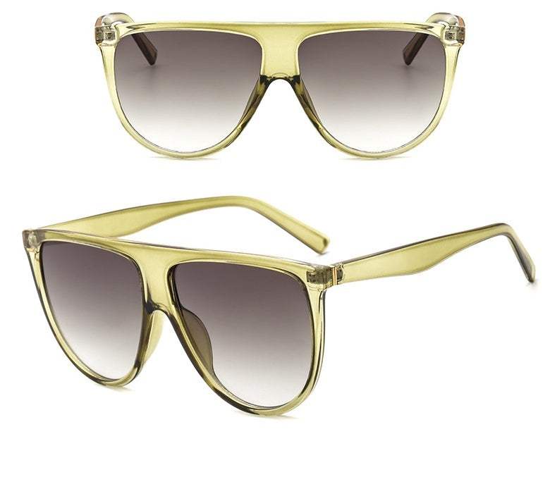 Women's full-frame sunglasses with gradient lenses for UV protection.