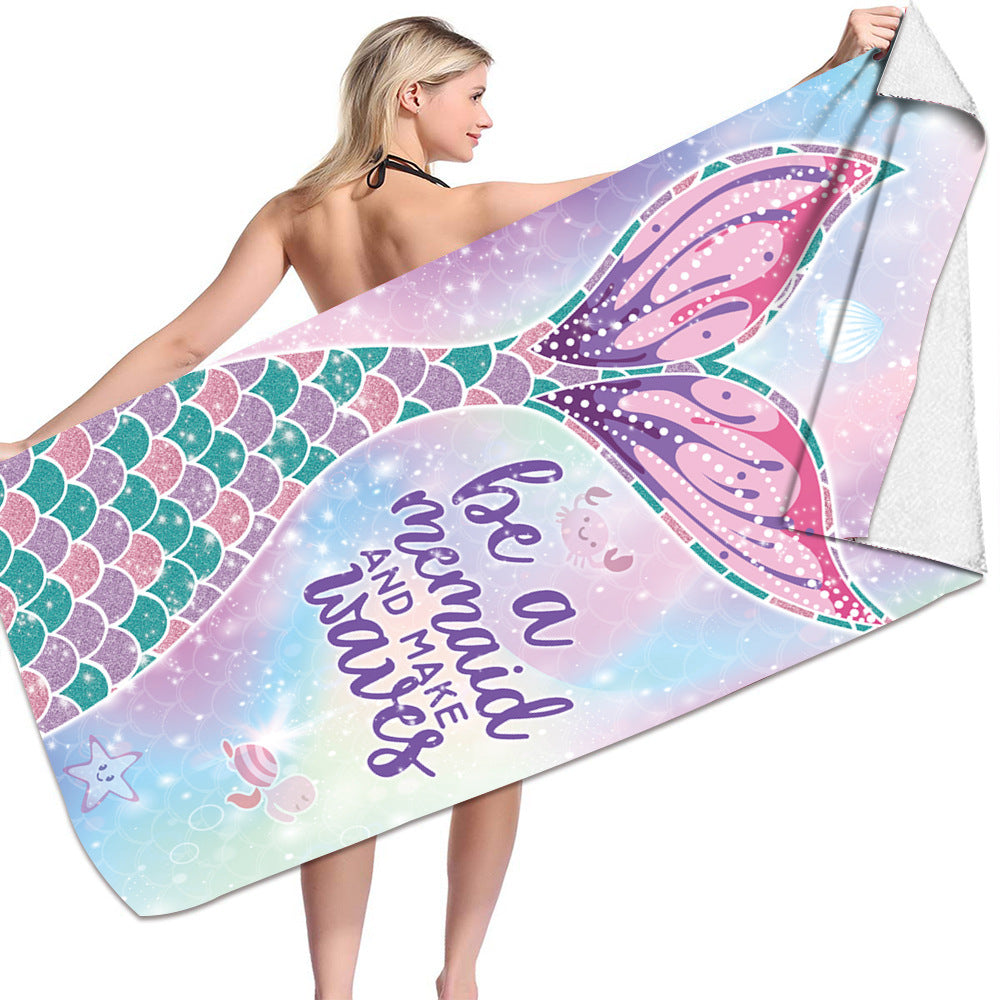 Microfiber bath towel with mermaid design and "be a mermaid and make waves" text.