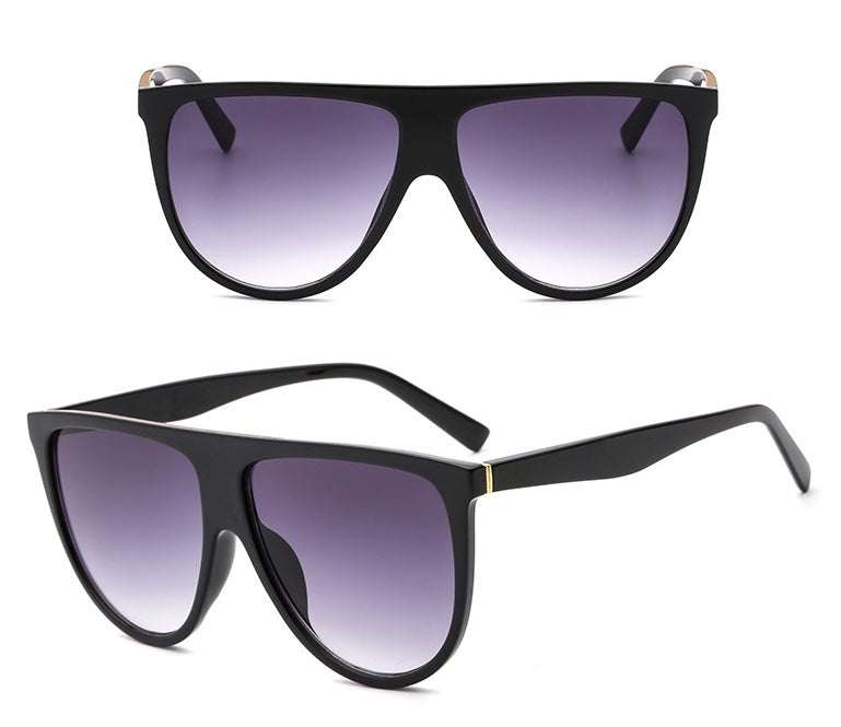 Sunglasses for women with gradient lenses, full-frame design, UV protection.