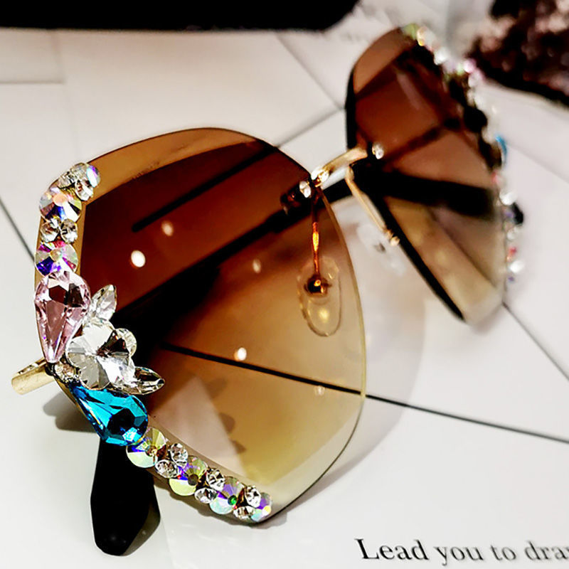 Luxury rhinestone square sunglasses with gradient brown lenses and chic metal temple design.