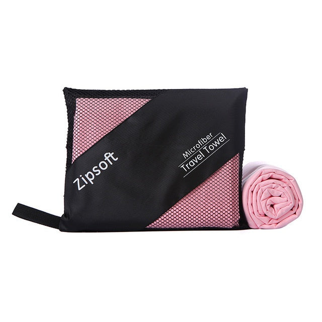 Exercise towel made from superfine polyester fiber with carrying pouch.
