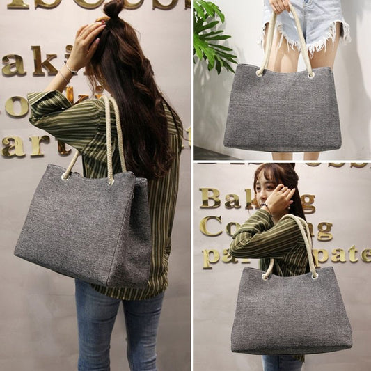 Large capacity Korean-style women's cotton shoulder bag with woven design and soft handle.