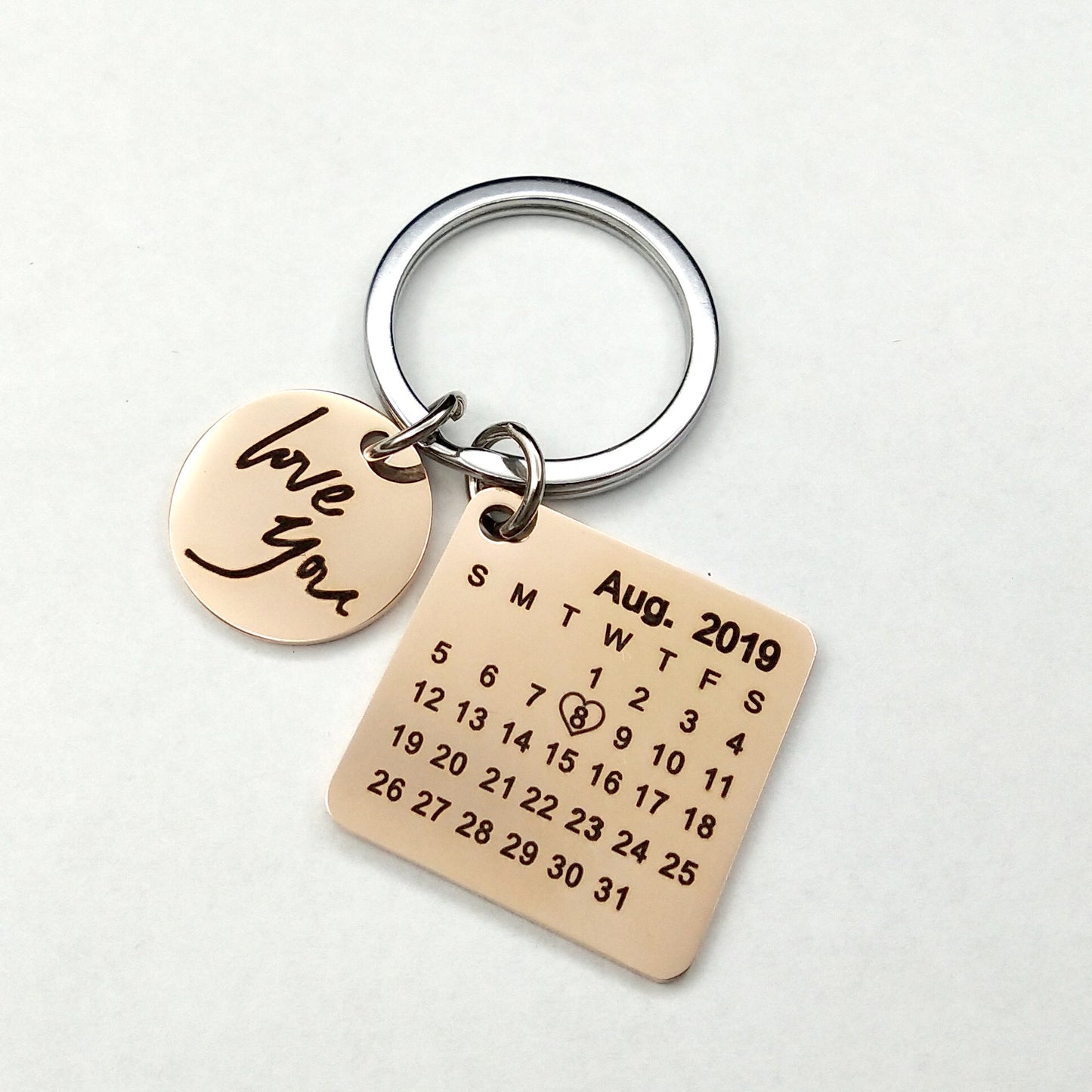 Custom DIY personalized calendar keychain with engraved date and love message, stainless steel.