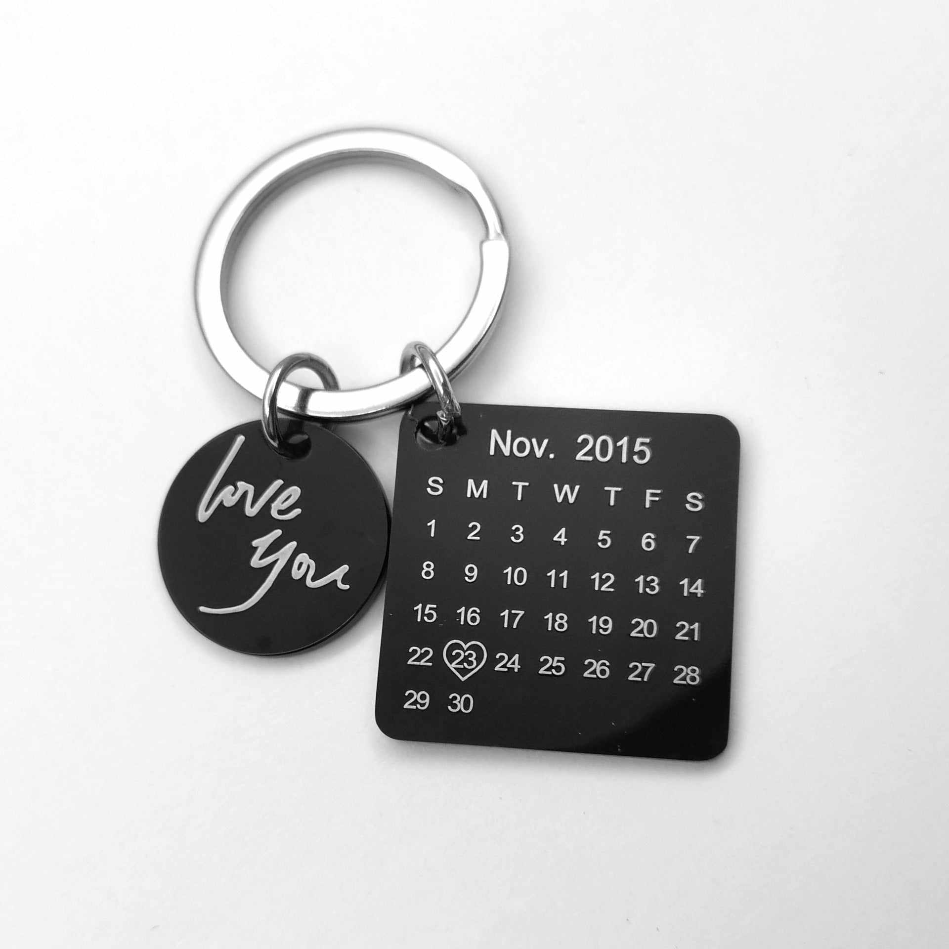 Custom DIY personalized calendar keychain featuring hand-carved details, perfect gift for loved ones, stainless steel design.